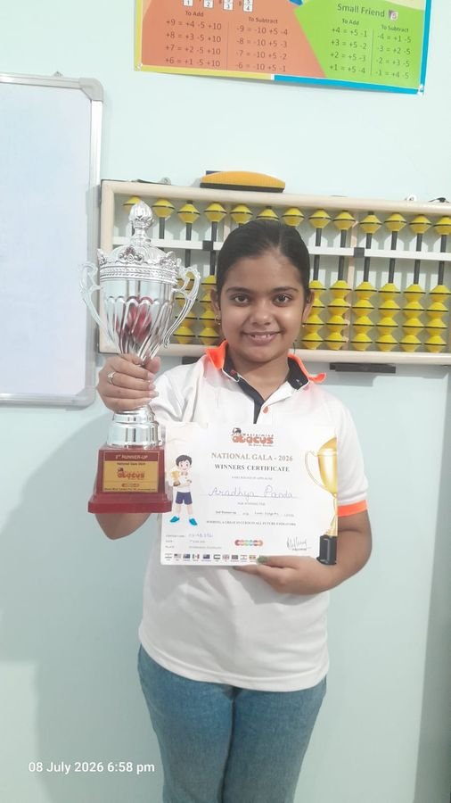 National Gala 2026 winner with trophy and certificate