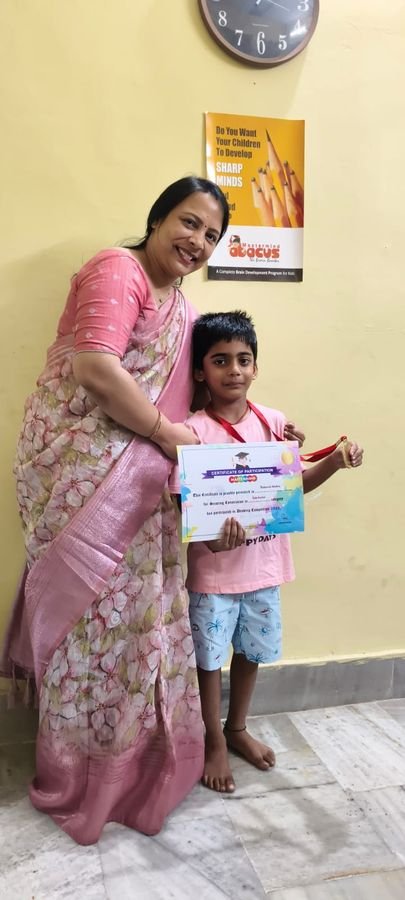 Student receiving a consolation medal and certificate