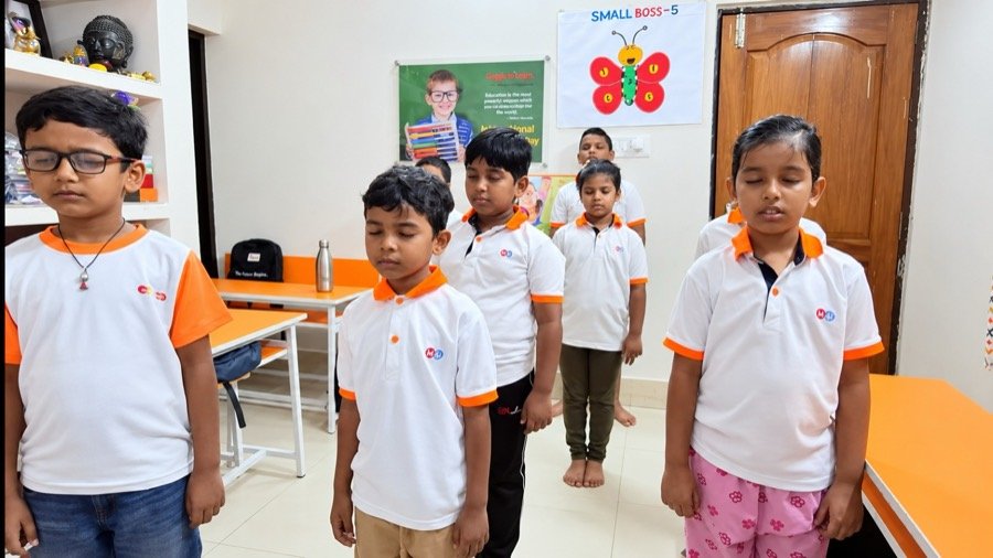 Children with eyes closed visualising an abacus to calculate mentally during a Mastermind Abacus class
